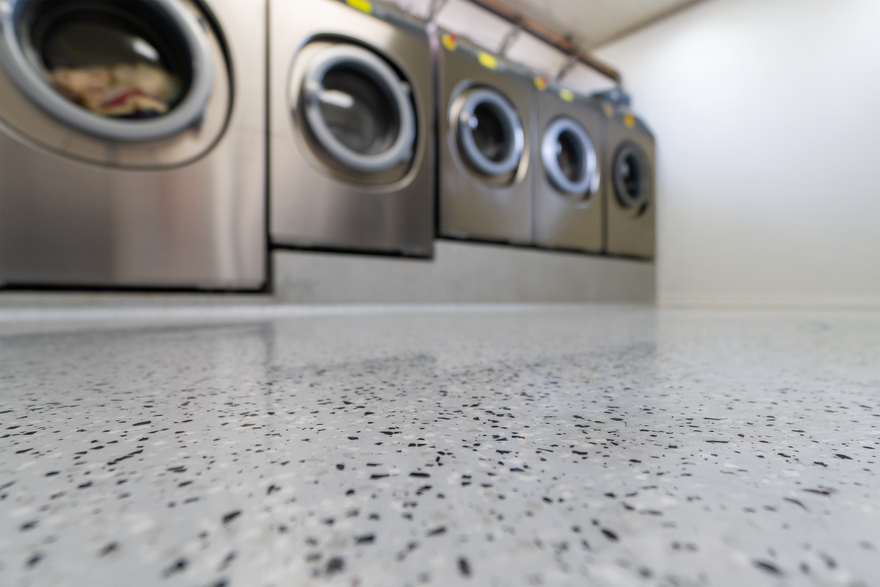 laundry floor with epoxy flakes